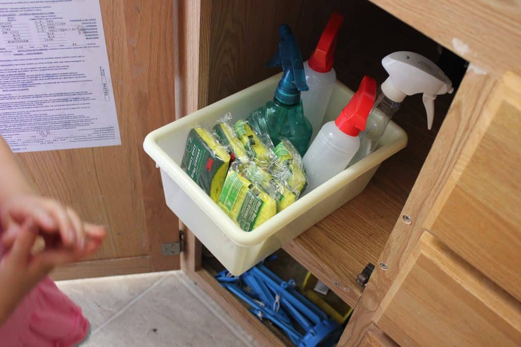 Cheap RV Kitchen Storage Ideas - use plastic bins