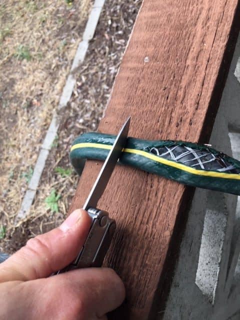 How to fix a garden hose - use a sharp knife to cut a clean, square cut