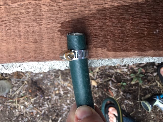 How to fix a garden hose. - slide your hose clamp over the newly cut "good" section of hose.