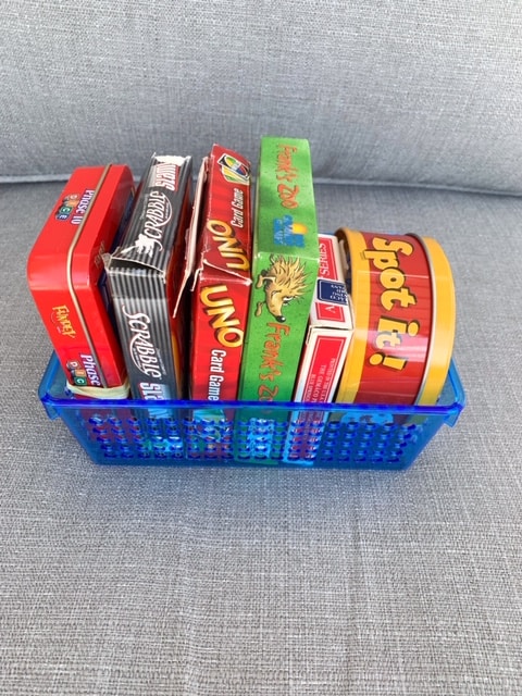 Game storage ideas - a plastic bin makes a handy board game storage container to keep in your RV