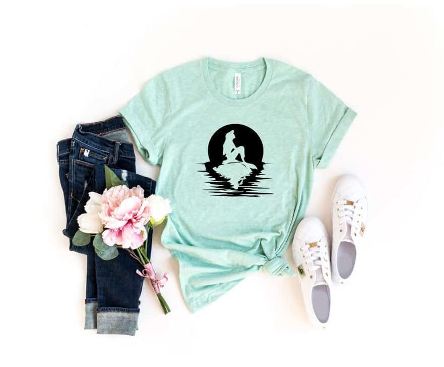 Disney Shirts for Women - Little Mermaid t shirt. Ariel sitting on a rock silhouette
