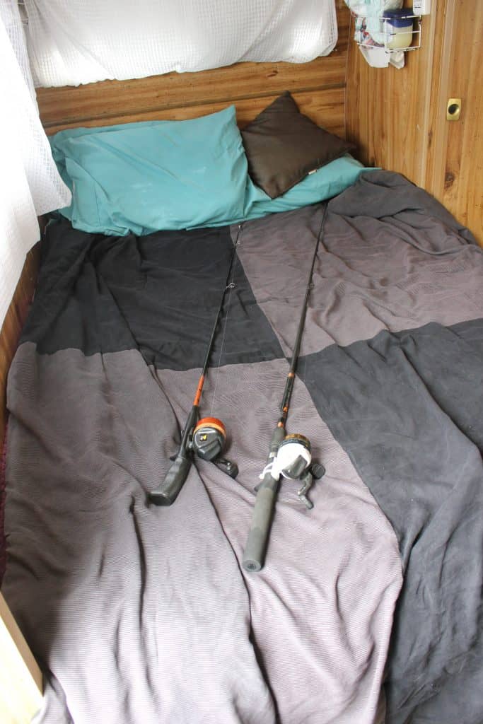 Where to store a fishing rod in an RV (lay it on the bed). A simple fishing rod storage idea.