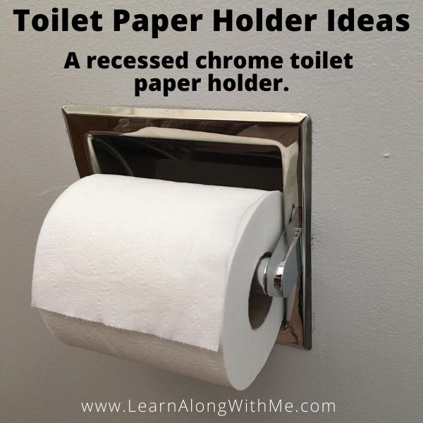 Recessed chrome toilet paper holder fits inside the wall stud space.