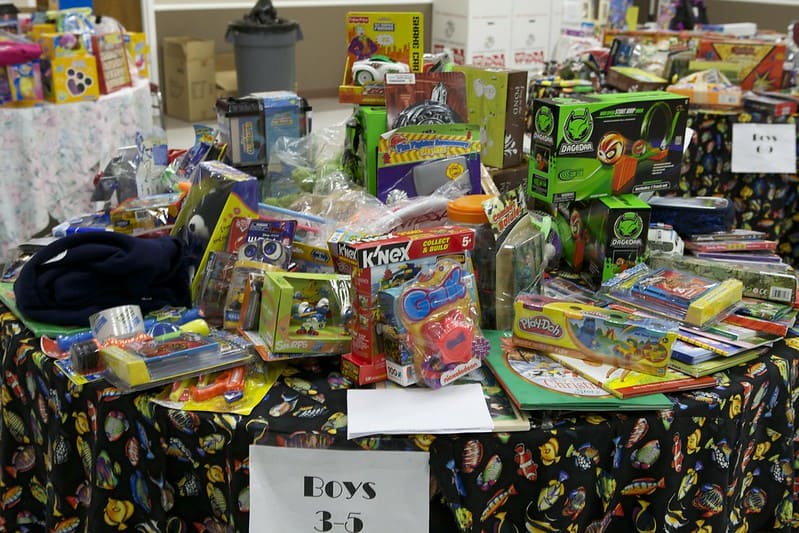 Christmas toy distribution - giving a toy to a child in need is a great way to get into the Christmas spirit