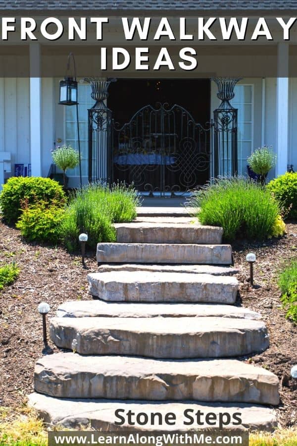 Beautiful front yard landscaping with stone steps, solar lights, bark mulch, ornamental grasses and shrubs.