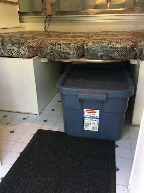 Plastic totes come in handy when organizing a tent trailer