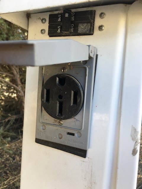 A campsite's 50 amp power outlet.