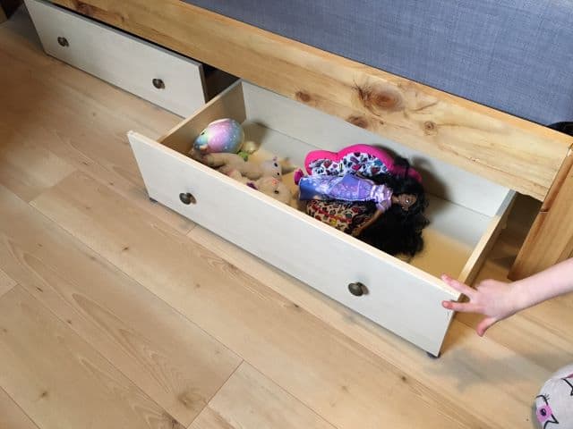 Using old dresser drawers as under bed storage drawers