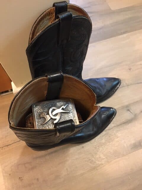 A unique belt storage idea is to store your rolled up belt inside the boots or shoes it goes with.