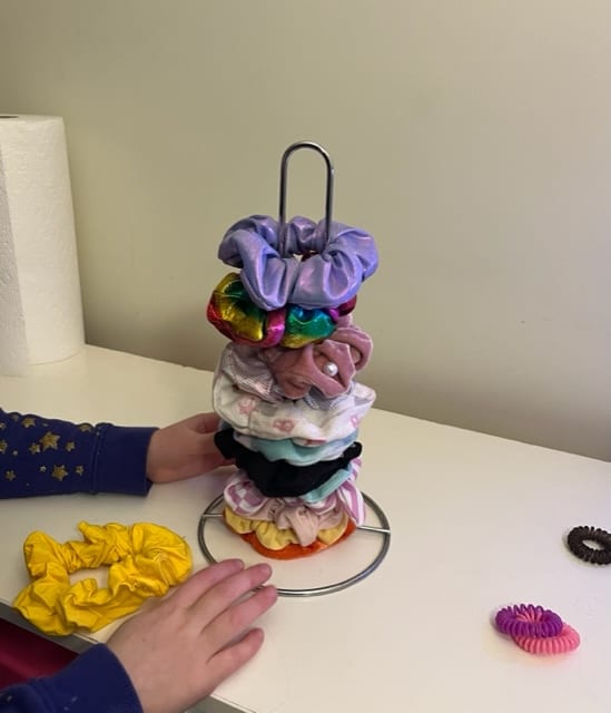 Scrunchie storage ideas - you can use a vertical paper towel holder (sometimes called a countertop paper towel holder) to hold scrunchies