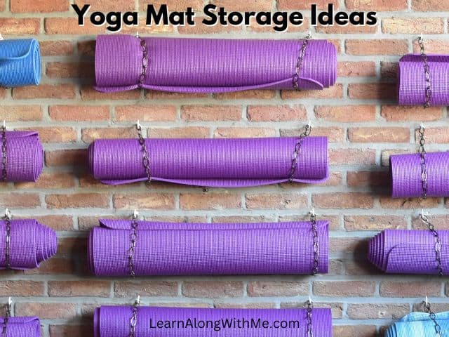 A DIY way to store yoga mats on your wall is to screw cup hooks into the wall, hang a piece of chain from it and use the chain to wrap around your yoga mat